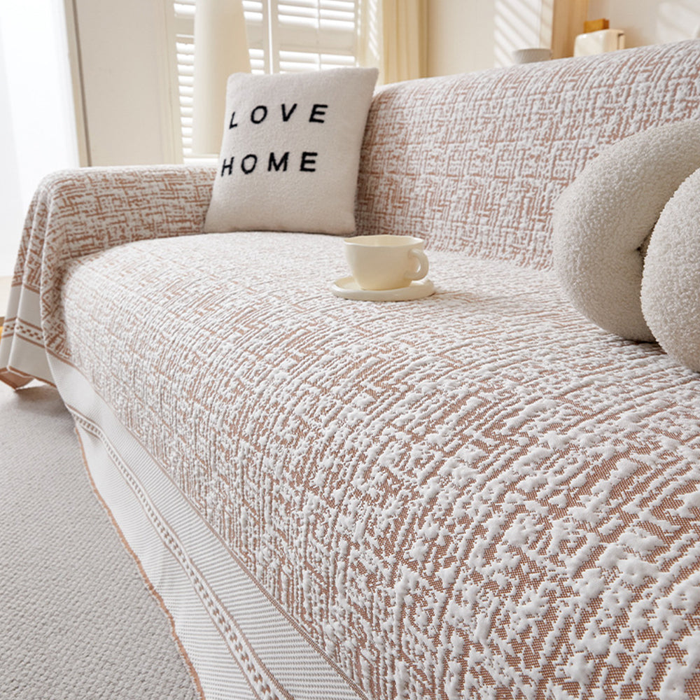 Folded ice silk couch cover, ready for easy installation and machine washing, perfect for pet-friendly homes