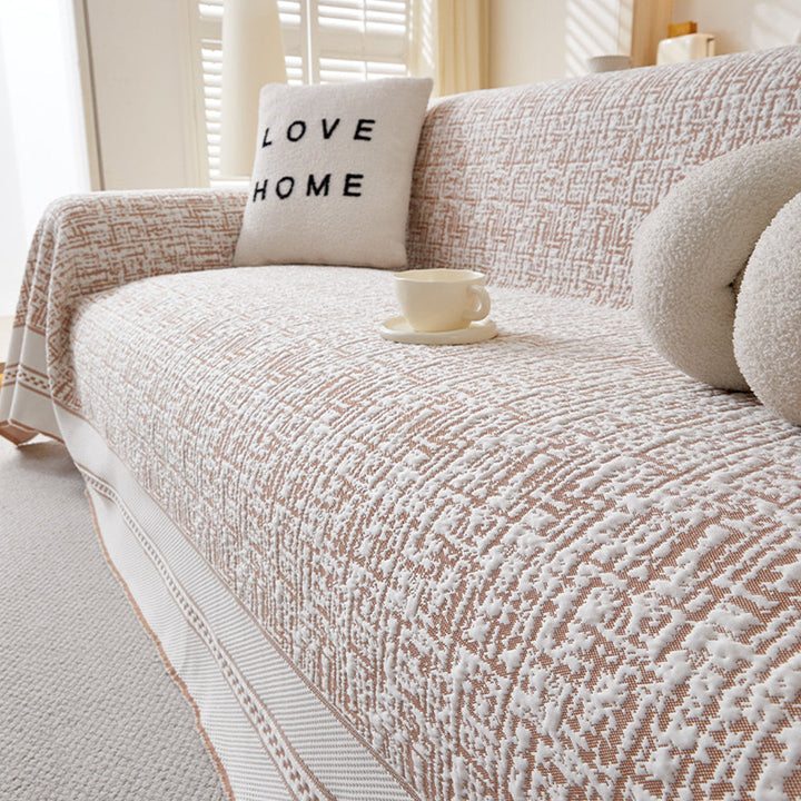 Folded ice silk couch cover, ready for easy installation and machine washing, perfect for pet-friendly homes