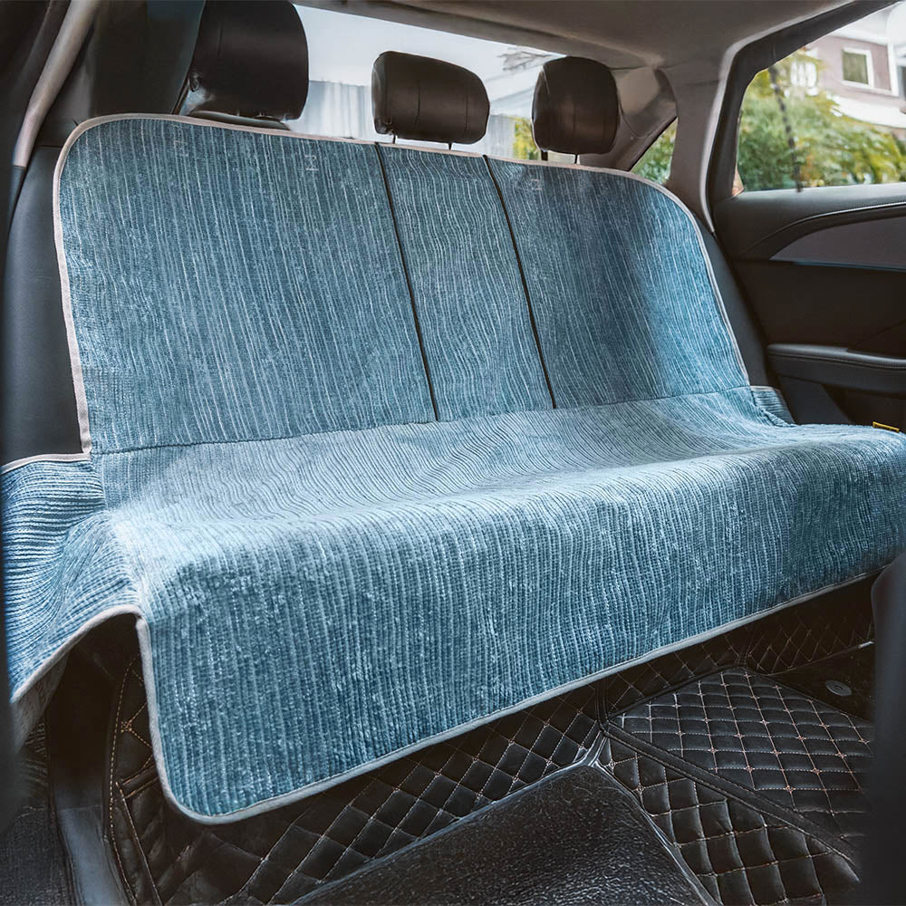 Back view of a pet car seat cover, highlighting non-slip backing and secure straps for cars