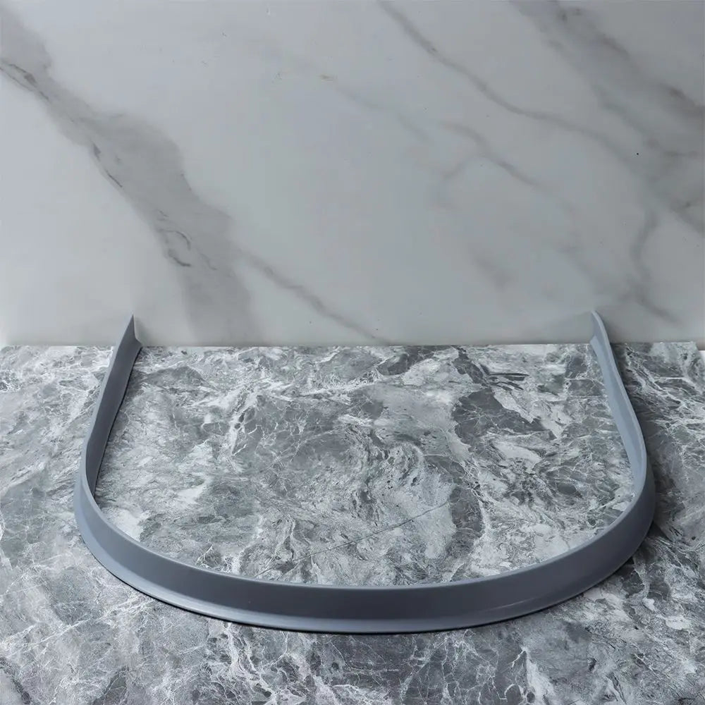 Universal silicone strip barrier, ideal for preventing water overflow in showers and wet spaces.