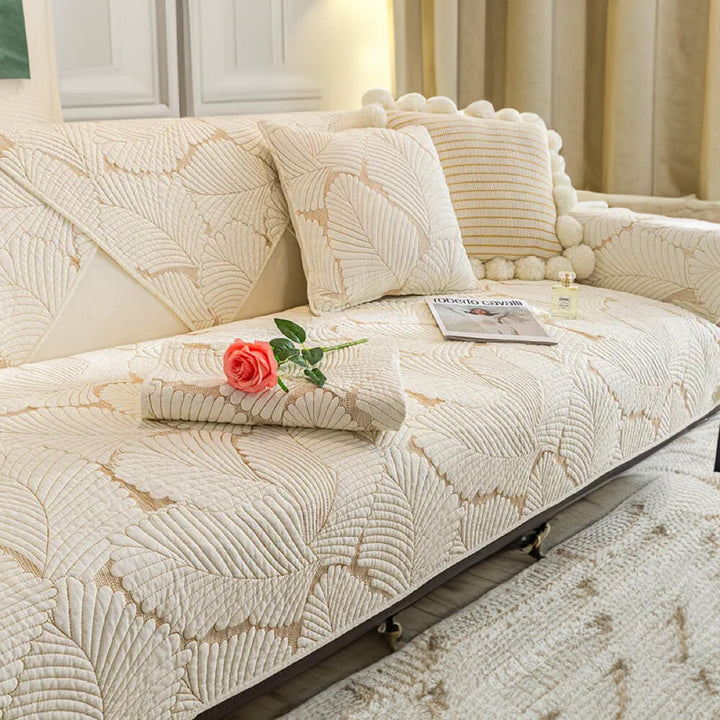 Hard-wearing universal sofa cover, anti-slip feature, cotton material for furniture preservation. Elegant.
