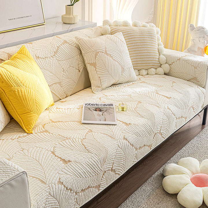 Pet-friendly universal couch cover, anti-slip backing, durable cotton for furniture protection & home decor.