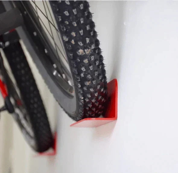 Efficient wall bike hook for garage organization. Securely store your bike vertically, saving floor space.