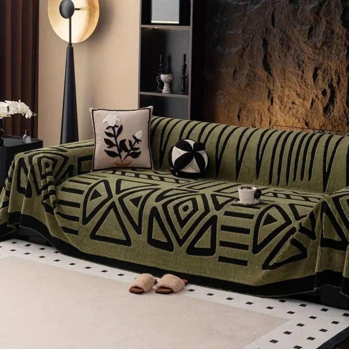 Modern living room featuring an Urban Maze jacquard sofa cover, stylish home decor & pet-friendly protection.