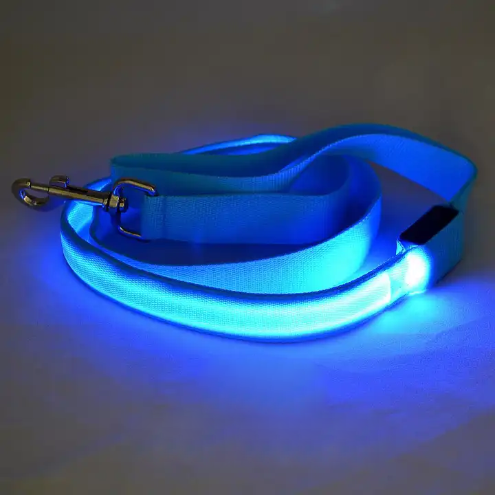 Reflective and LED illuminated dog leash, ensuring pet safety during night walks.