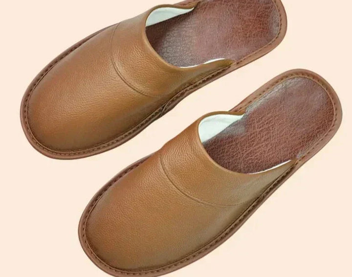 Comfortable men's house slippers, slip-on style, ideal for indoor relaxation & cozy lounge.