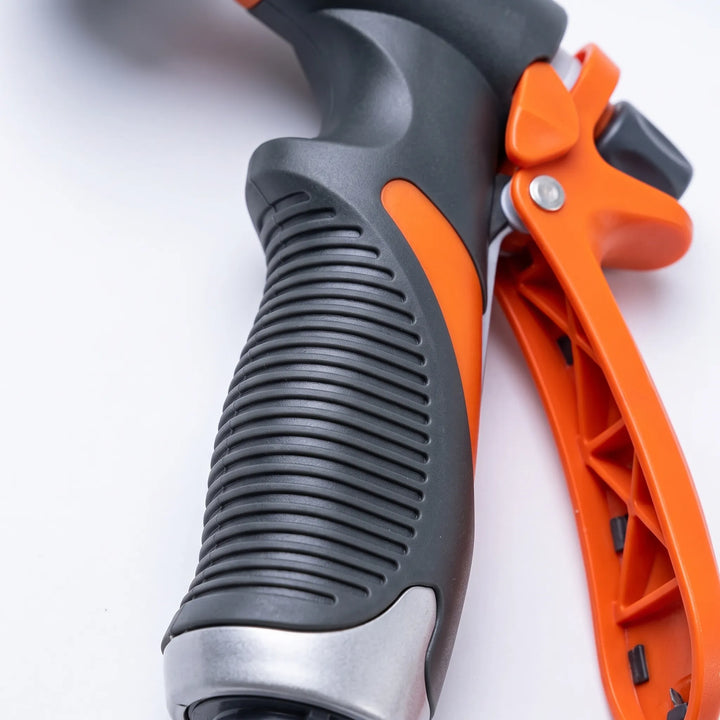 Multipurpose 8-pattern garden nozzle with trigger lock for home garden watering & outdoor cleaning.