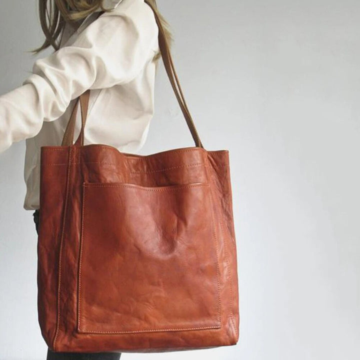 Versatile women's everyday shoulder tote bag in classic coffee brown, perfect for daily fashion.