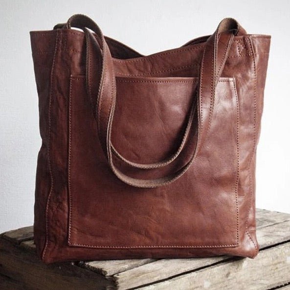 Stylish black women's shoulder tote bag and handbag, a versatile fashion accessory for everyday use.