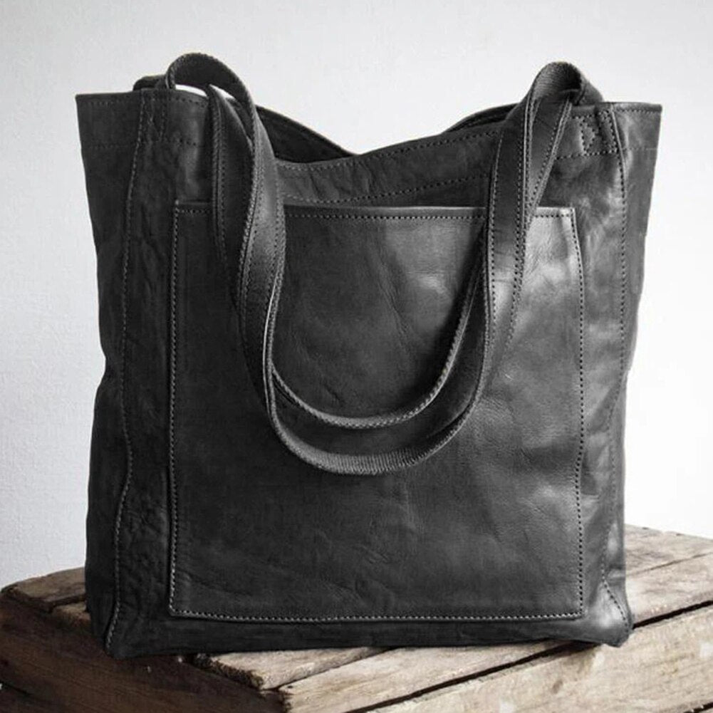 Classic style women's versatile shoulder tote bag in black, a timeless fashion accessory for women.