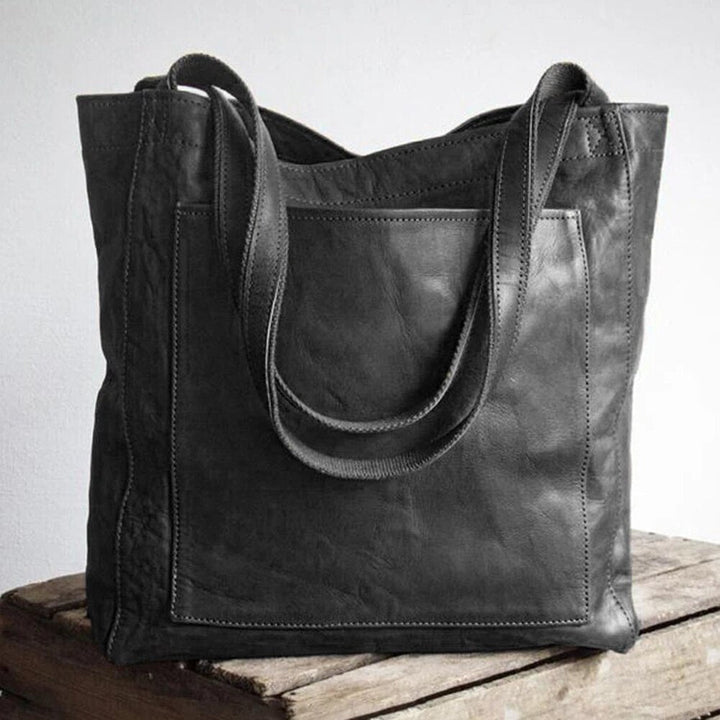 Classic style women's versatile shoulder tote bag in black, a timeless fashion accessory for women.