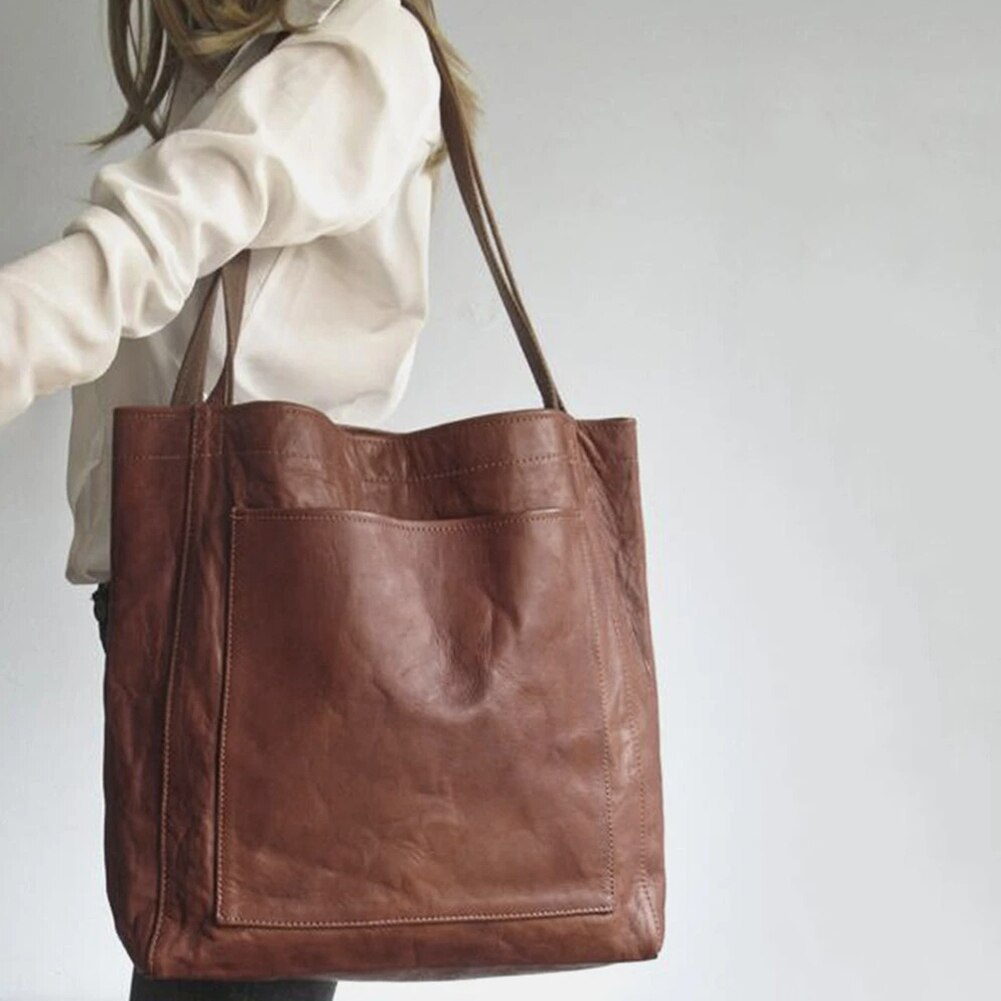 Elegant coffee brown everyday tote bag for women, a spacious and versatile shoulder bag.