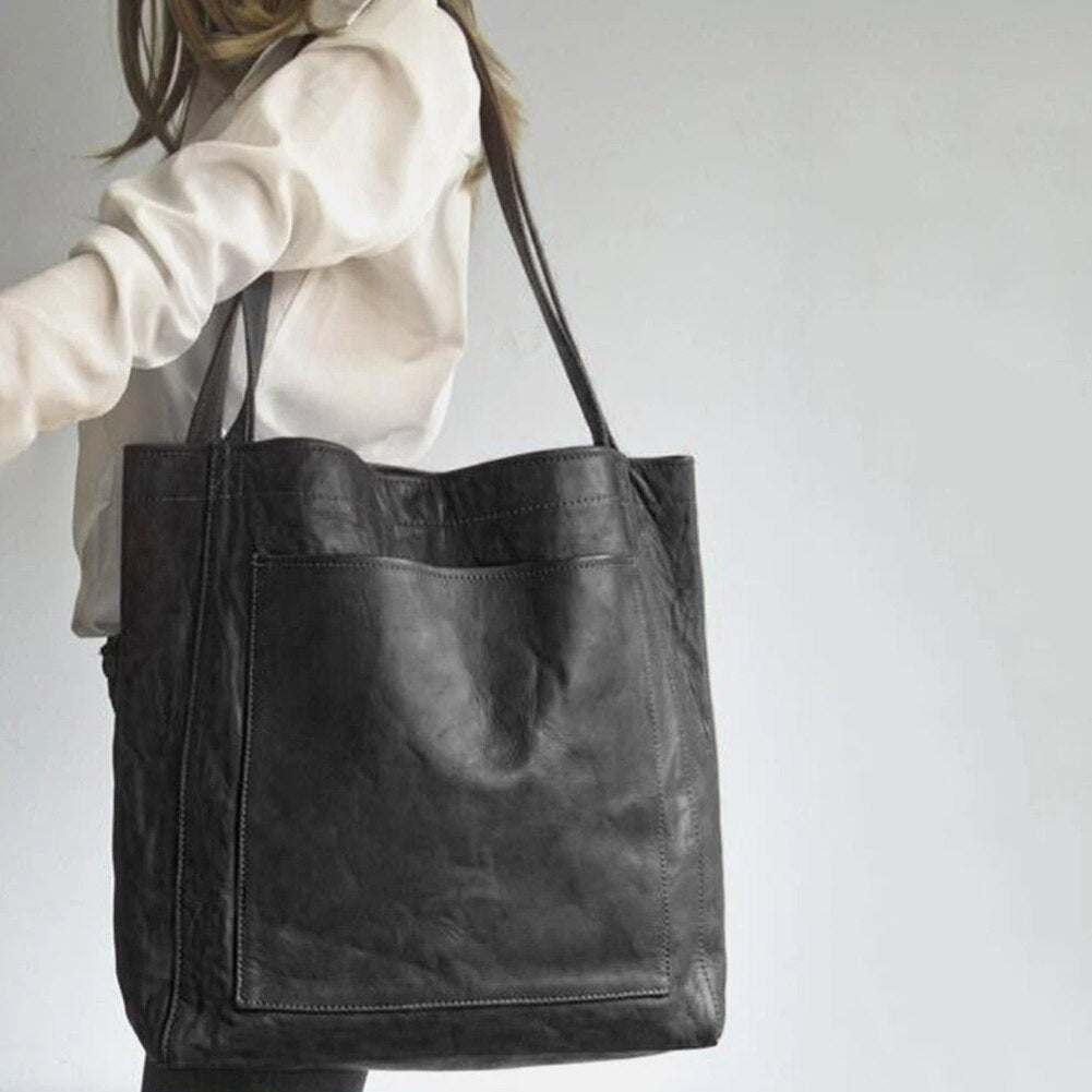Versatile women's shoulder tote handbag in coffee brown & black, ideal for daily fashion needs.