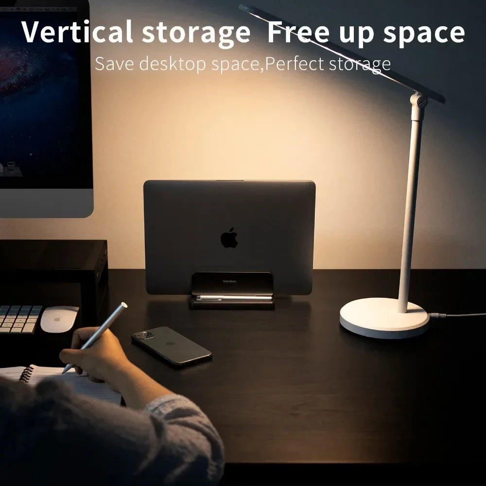 Sleek space-saving vertical laptop stand, decluttering your desk and organizing your tech accessories efficiently.