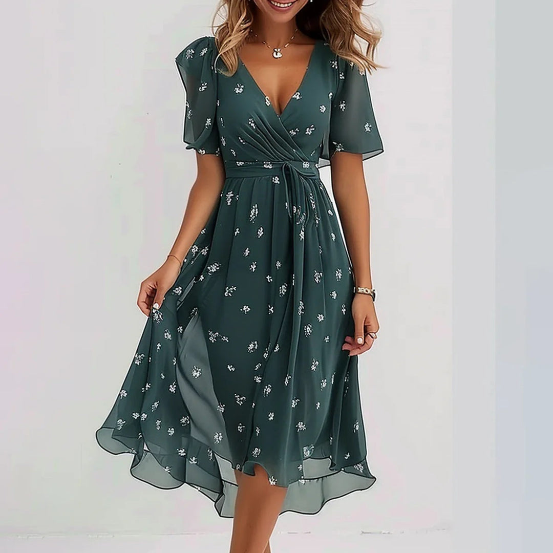 Women's vibrant abstract midi dress, an elegant flowy design for a stylish and comfortable fashion statement.