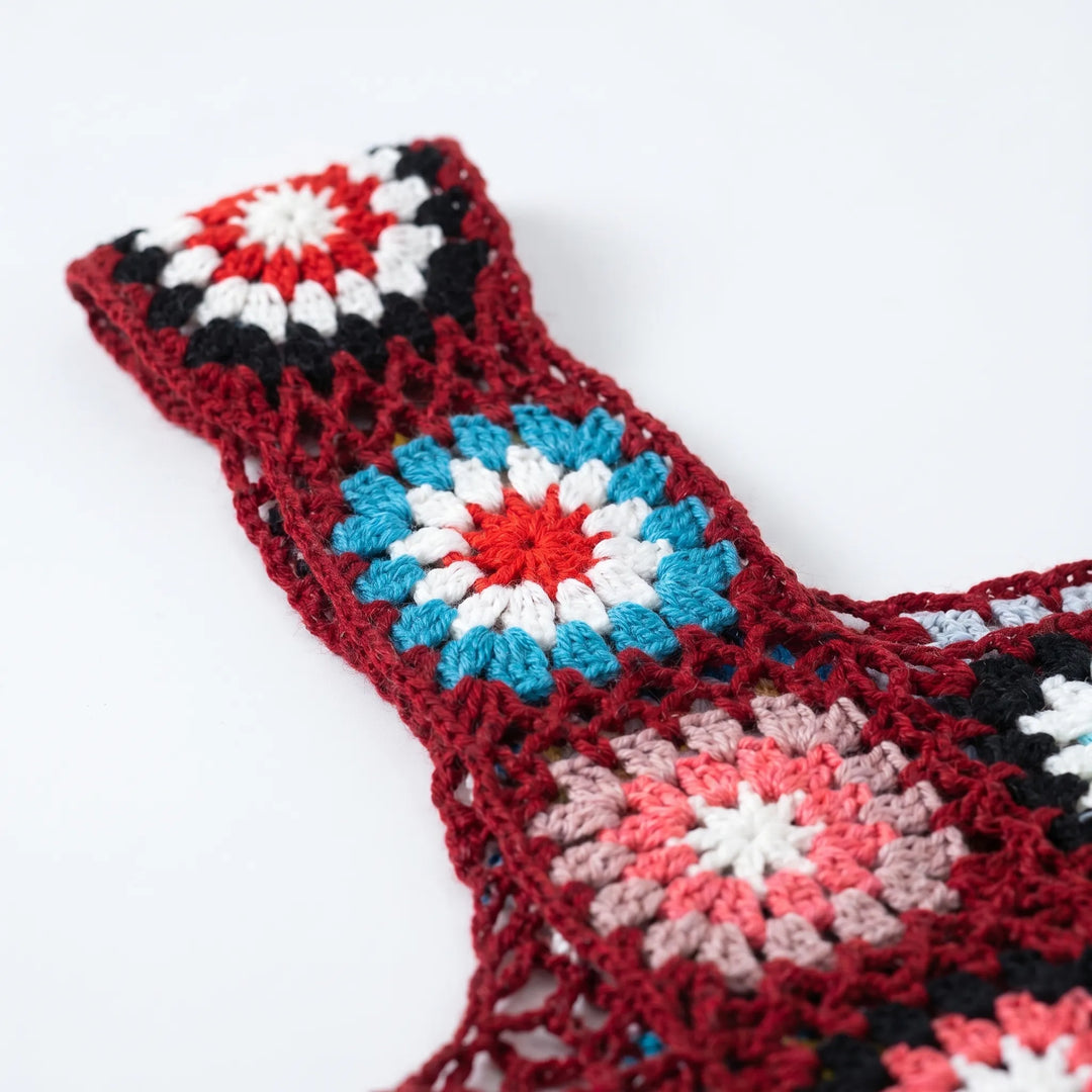 Women's sleeveless crop top with a vibrant bohemian print, ideal for a stylish summer or casual layered look.