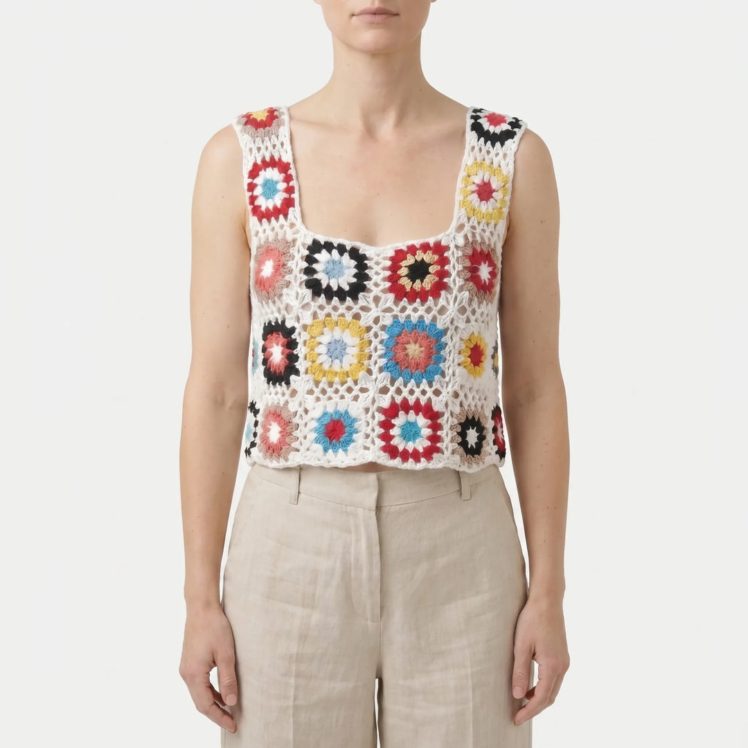 Colorful vibrant women's sleeveless crop top, showcasing a unique bohemian summer fashion statement piece.