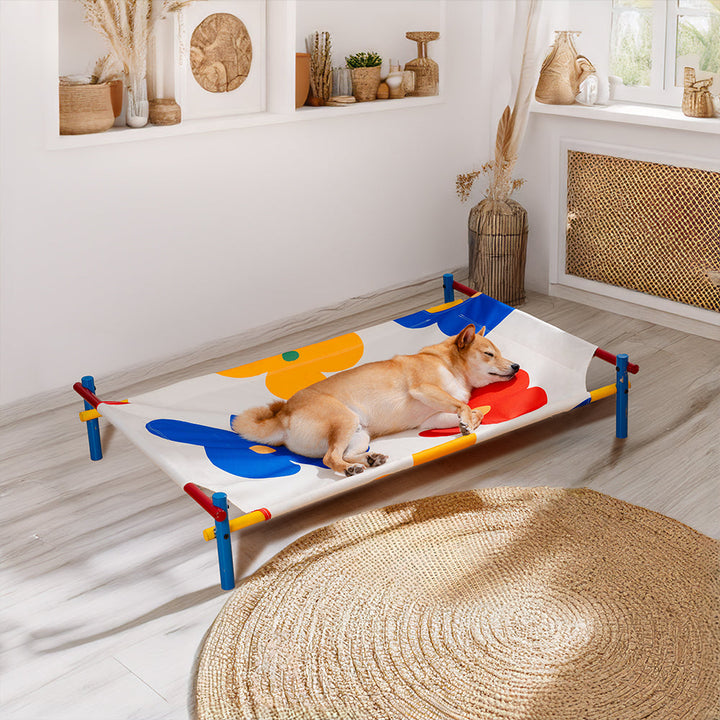 Durable elevated dog bed with a vibrant summer print, ideal for outdoor use and pet comfort.