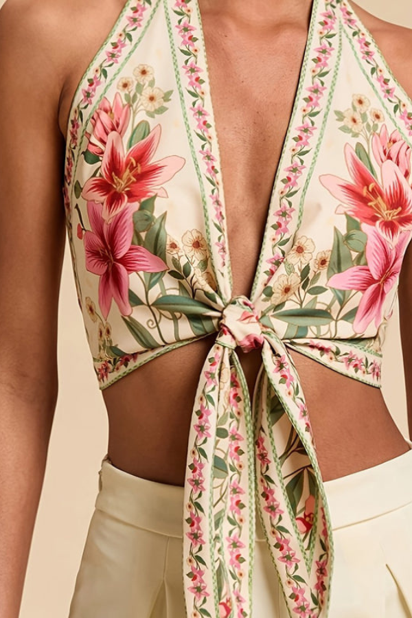 Elegant vibrant floral halter top for women, ideal for summer outings & beach trips.