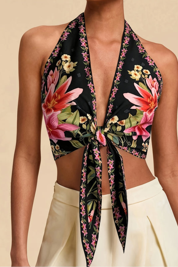 Sleeveless vibrant floral halter top for women, a lightweight & chic summer essential.