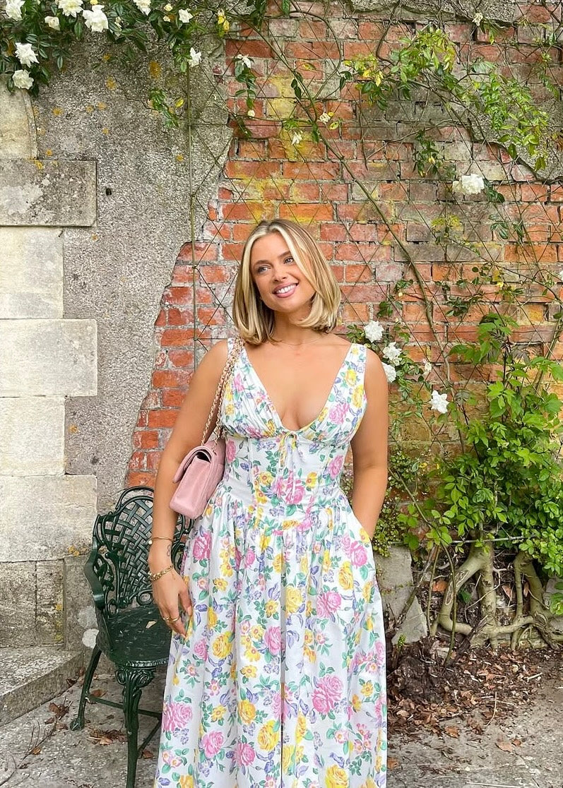 Beautiful women's floral midi dress, perfect as a wedding guest or garden party outfit, elegant corset top.