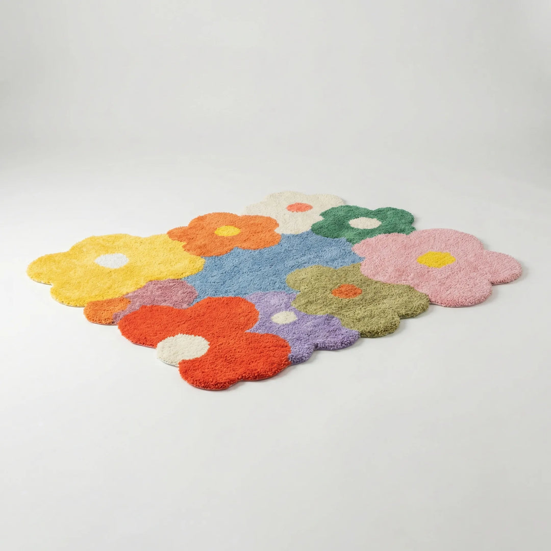 Statement Flowique floral area rug with scalloped edges & playful wave pattern, ideal for vibrant living room decor.
