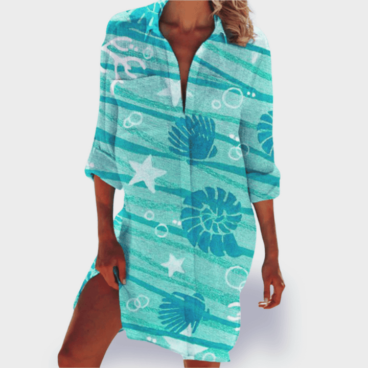 Colorful women's midi dress with vibrant design, flowy drape, and effortless summer style.