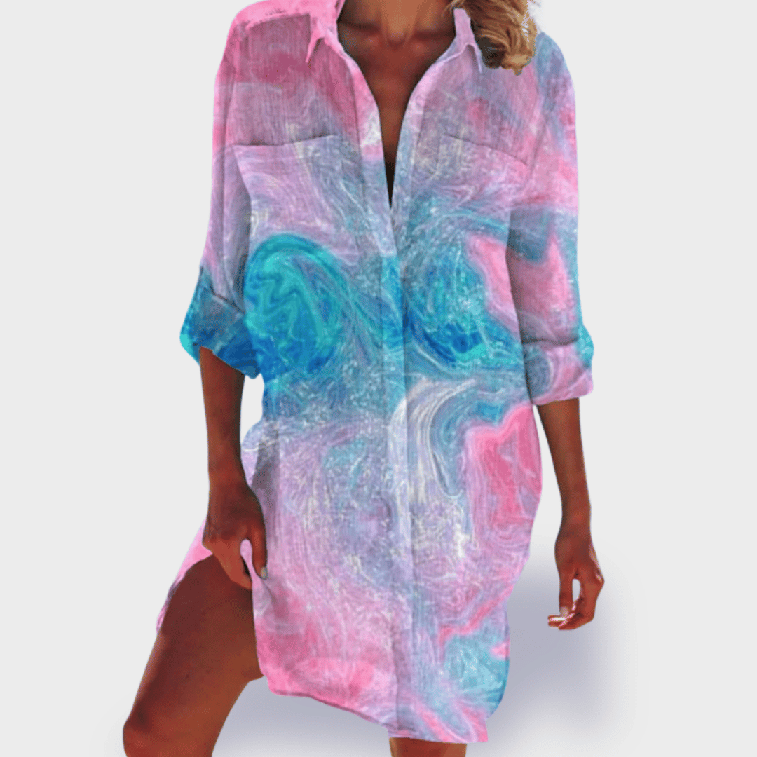 Women's vibrant colorful flowy draped midi dress with elegant silhouette, perfect for summer.