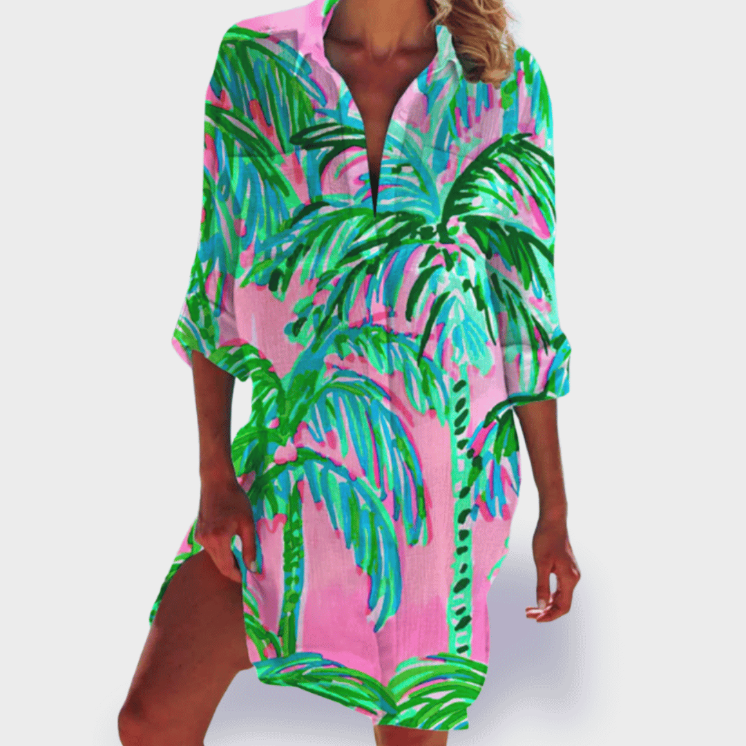 Brightly colored women's vibrant flowy draped midi dress, designed for effortless summer style.