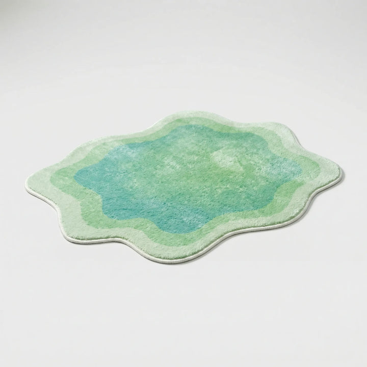 Colorful Flowique waves gradient area rug, a modern statement piece for bedroom or living room home decor.