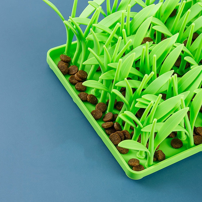 Non-slip dog feeding mat, silicone material, vibrant green grass design, keeps bowls in place