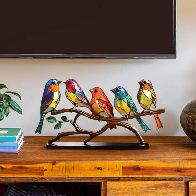 Unique handcrafted stained glass bird, a colorful suncatcher brightening windows and home decor spaces.