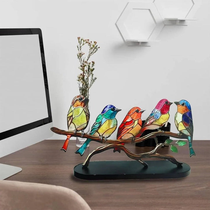 Colorful stained glass bird suncatcher, a lovely tabletop or shelf decor item for bird enthusiasts.