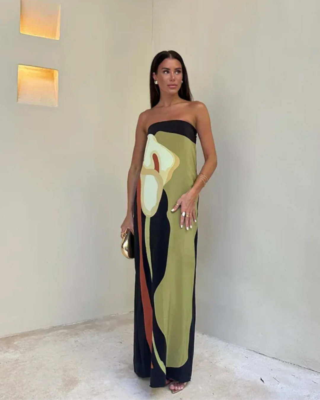 Vibrant maxi dress for women, off-shoulder with a bold summer print. Perfect for holiday vacation style.