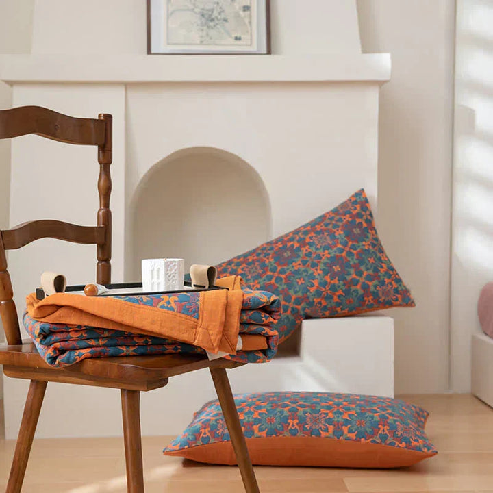 Comfortable six-layer cotton quilt in vibrant orange & blue, suitable for any bedroom decor. Eco-friendly bedding.