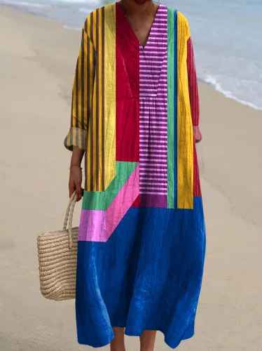 Comfortable long sleeve V-neck maxi dress with vibrant patchwork print, ideal for a stylish and elegant casual look.