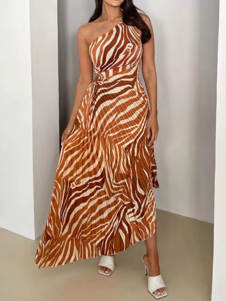 Sophisticated wedding guest dress: vibrant printed one-shoulder gown for women. Elegant and chic.