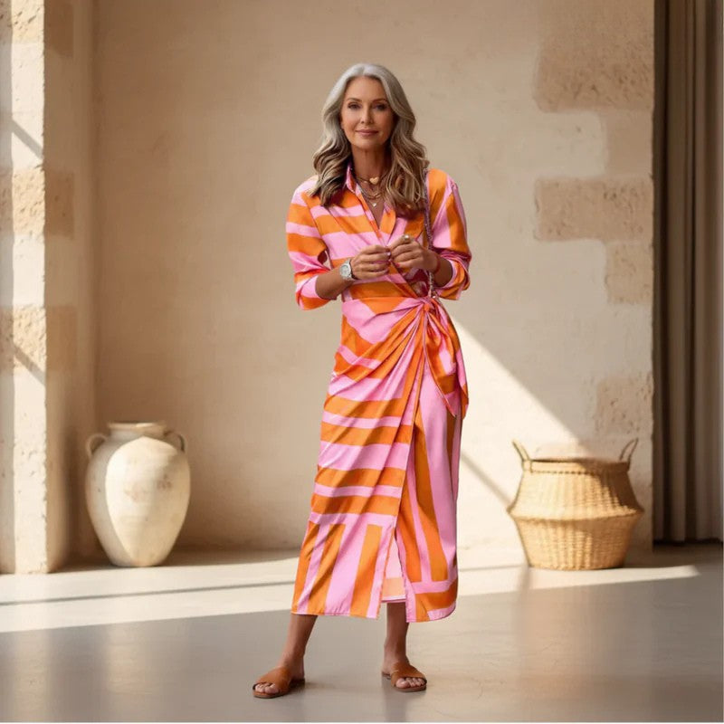 Vibrant printed wrap dress for women. Chic summer style, perfect for casual or elegant occasions.