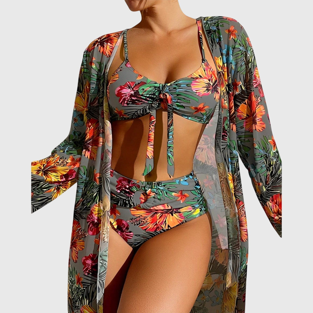Flattering tropical print two-piece bikini for women. Vibrant swimwear for confident summer beach and resort wear.