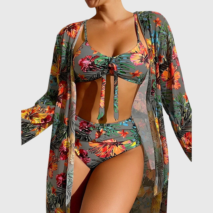 Flattering tropical print two-piece bikini for women. Vibrant swimwear for confident summer beach and resort wear.