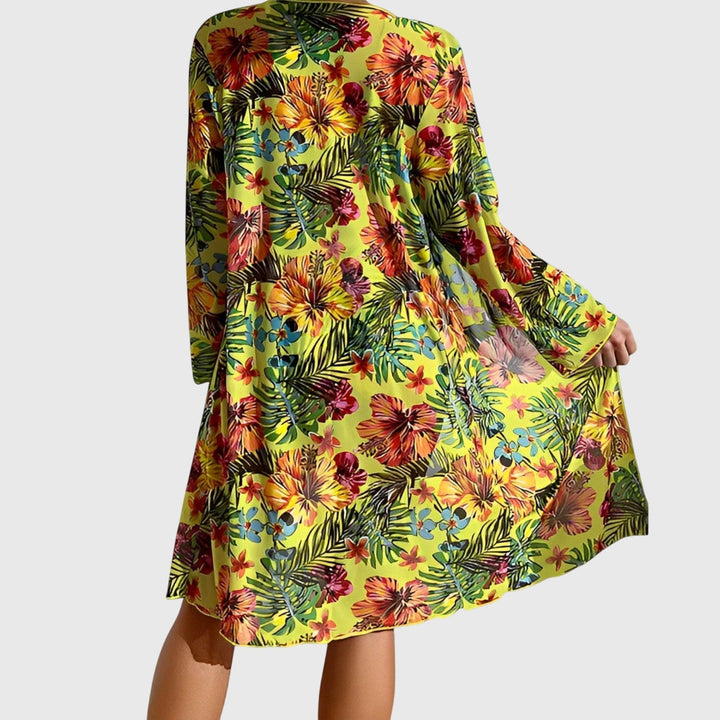 Women's vibrant tropical floral print bikini. Two-piece swimsuit set, flattering beachwear for summer vacation.