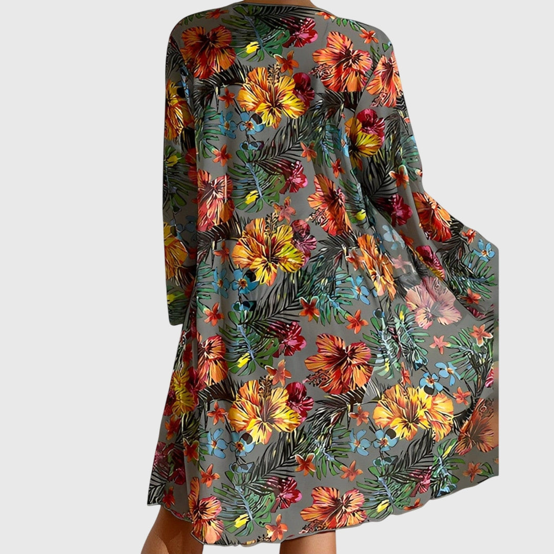 Complete women's tropical print two-piece bikini swimsuit set. Vibrant beachwear for summer vacation & resort trips.