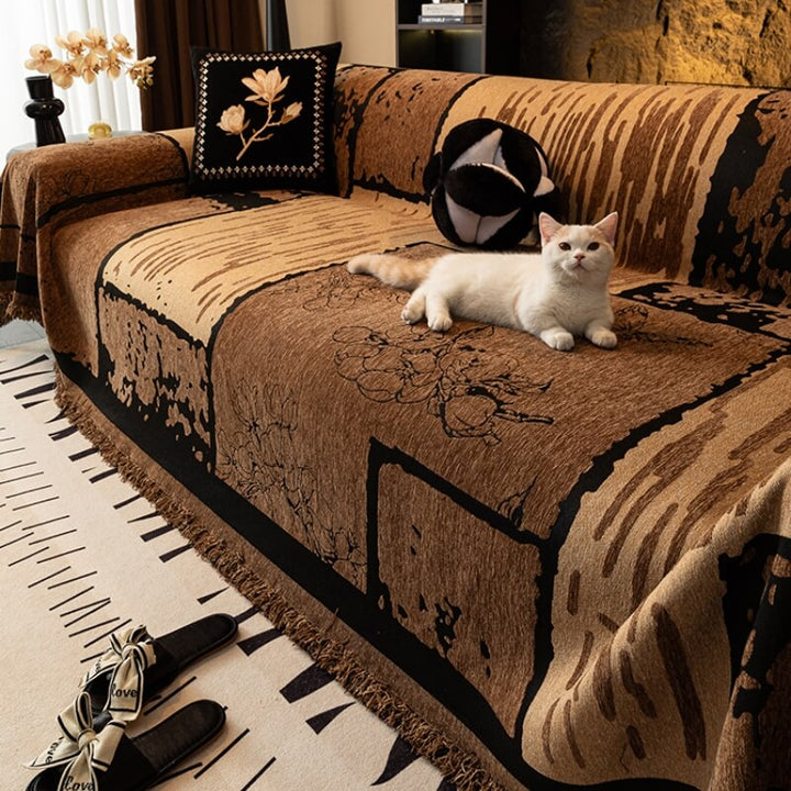 Vintage chenille couch cover in a muted tone, draped over a sofa for pet-friendly furniture protection