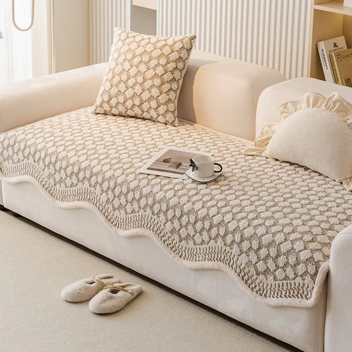 Top-down view of a vintage chenille scratch resistant couch cover, ideal for pet owners