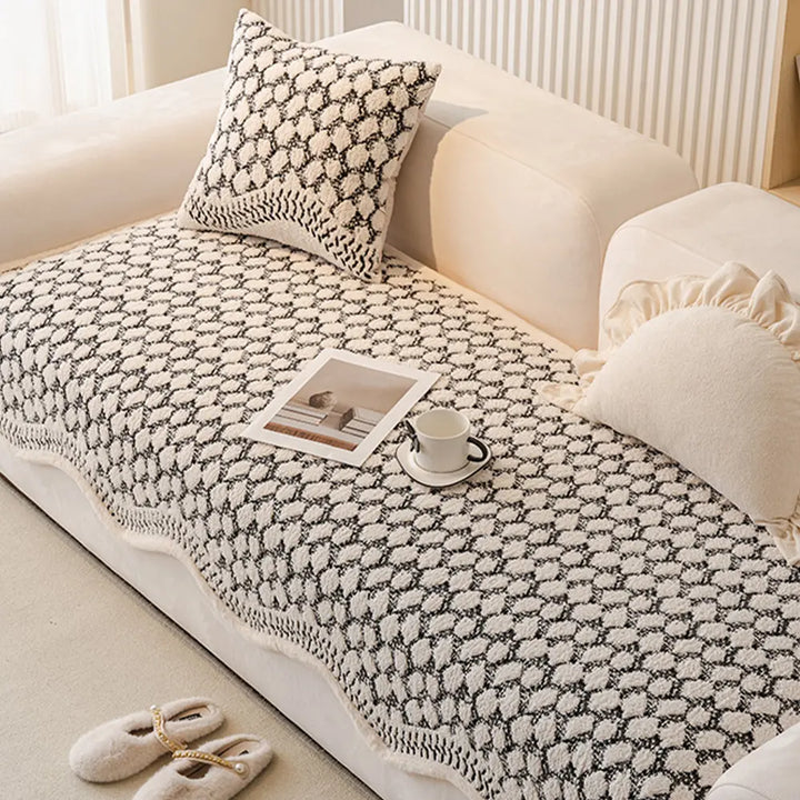 Swatch of vintage chenille fabric highlighting the scratch resistant quality of the sofa cover