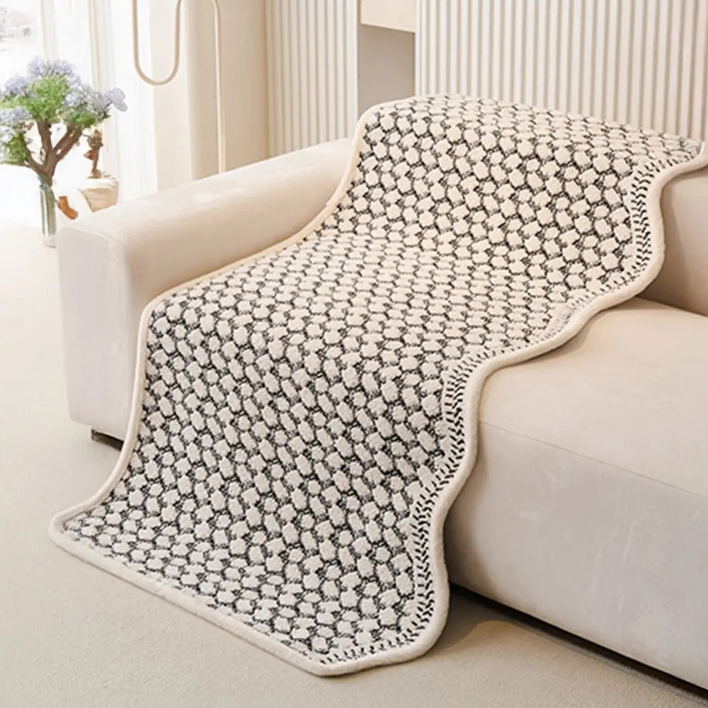 Vintage chenille scratch resistant couch cover draped over a sofa, enhancing home decor