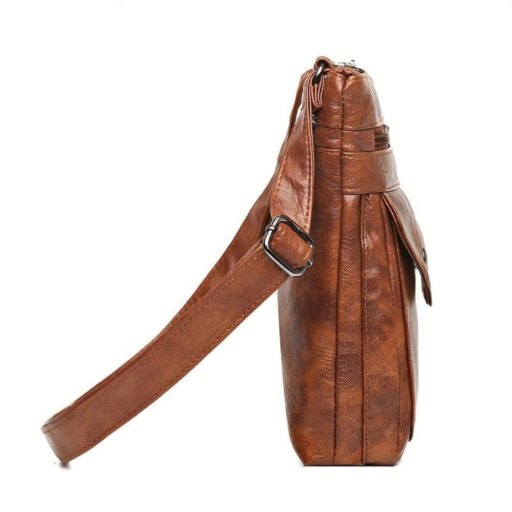 Women's vintage crossbody bag in faux leather, classic everyday style.