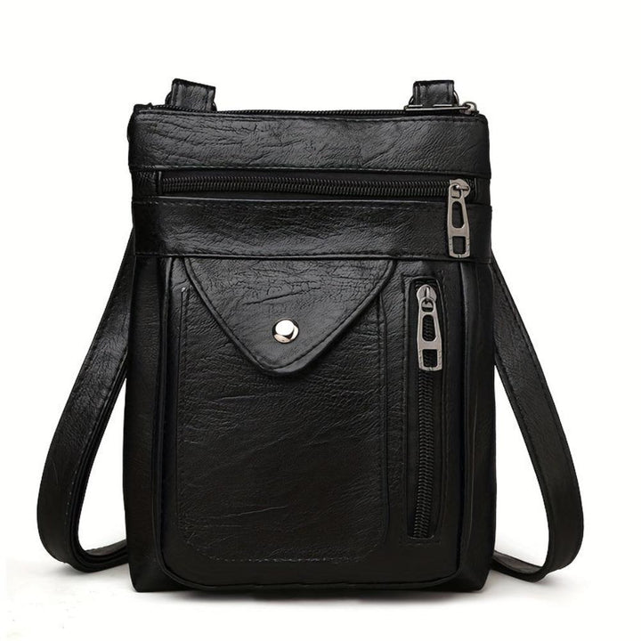 Women's vintage faux leather handbag, crossbody shoulder bag for classic everyday use.