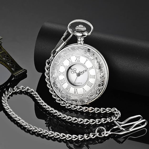 Unisex vintage pocket watch with intricate Roman numerals, enhancing any elegant outfit.