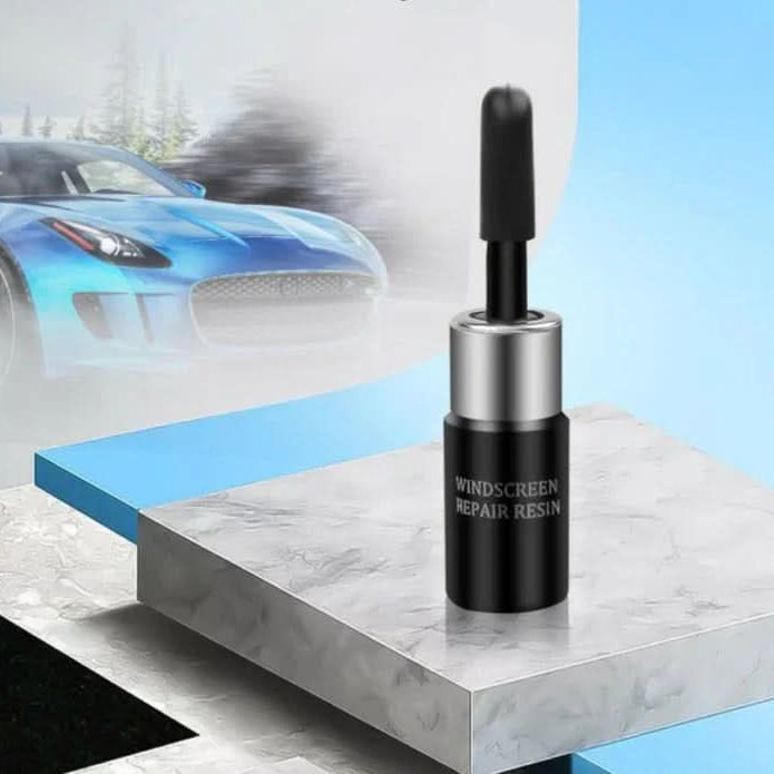 Close-up of VISIFIX resin kit, applicator, and tools for professional-grade auto glass chip and crack repair.